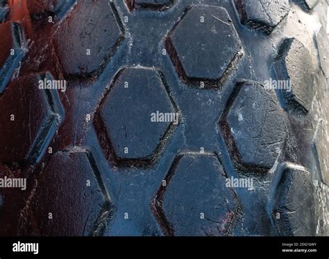 Tire Treads On The Rubber Tire Of A Large Construction Machine Close