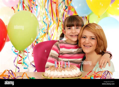 happy daughter and mother on birthday party Stock Photo - Alamy