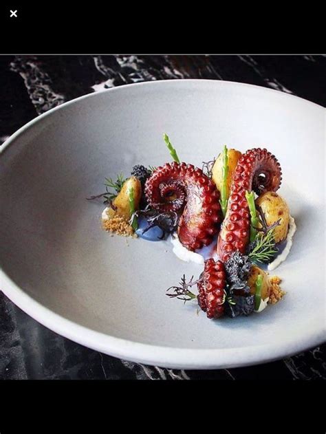 A White Plate Topped With Fruit And Vegetables