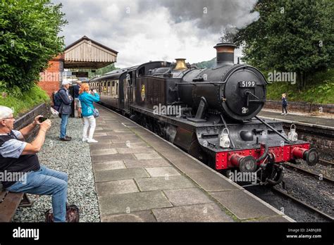 Tourists Watching A Steam Engine Leaving Llangollen Station Llangollen