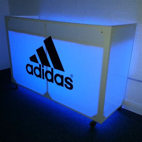 White DJ Booth Rental With LED Lighting and Logo Branding - DJ Peoples