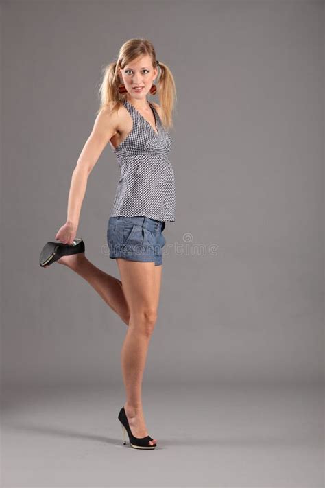 Sexy Blonde Fashion Model In Heels And Shorts Picture Image 17580638