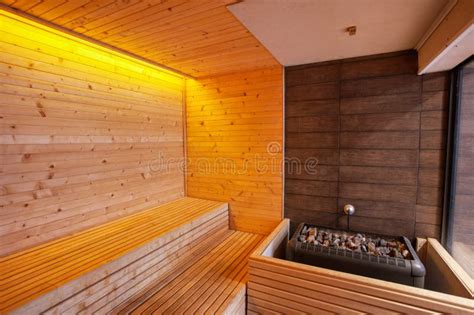 Modern Sauna Room In A Hotel With Wooden Walls And Bench Hot Stove Stock Image Image Of
