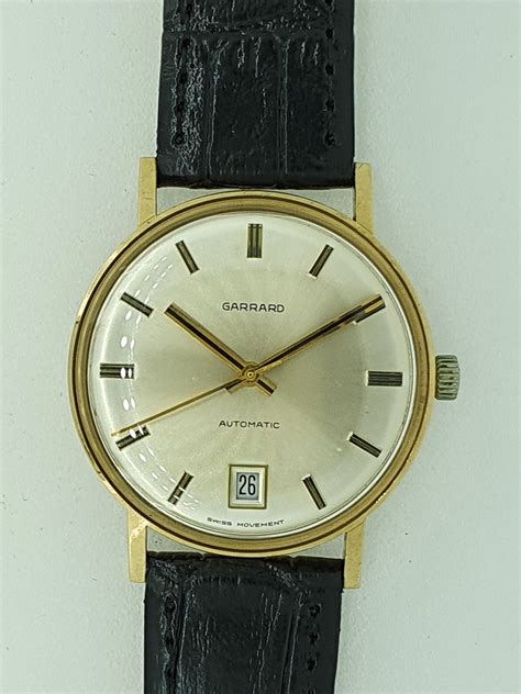 1974 1975 Garrard 9k gold automatic - Birth Year Watches