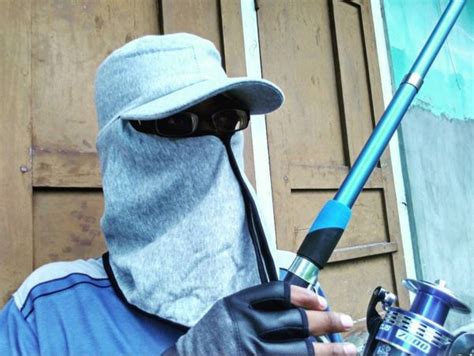 grosir topi tani  mancing
