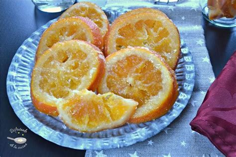 Sliced Oranges On A Plate Sitting On A Table