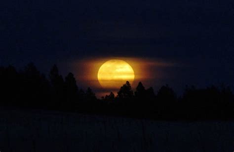 Fire Moon III Photograph by Caroline Haldeman - Pixels