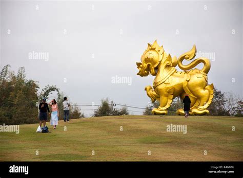 Gold Singha Statue On Hill For Traveler People Travel Visit And Take