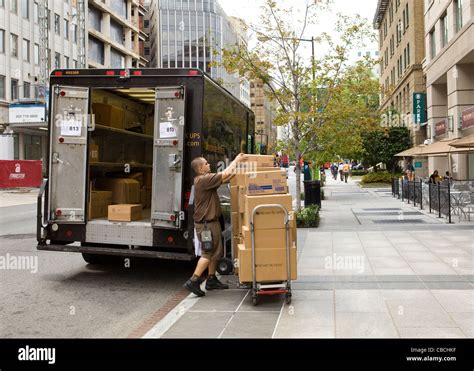 Ups Delivery Man Unloading Packages From Truck Washington Dc Usa