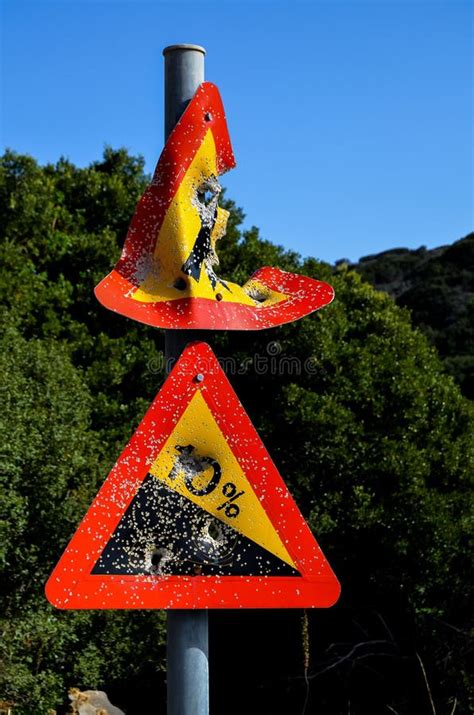 Vertical Shot of Damaged Road Signs Near Trees in Crete, Greece Stock ...