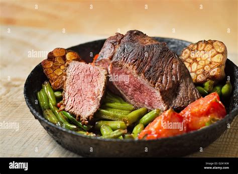 Roast beef with vegetables Stock Photo - Alamy