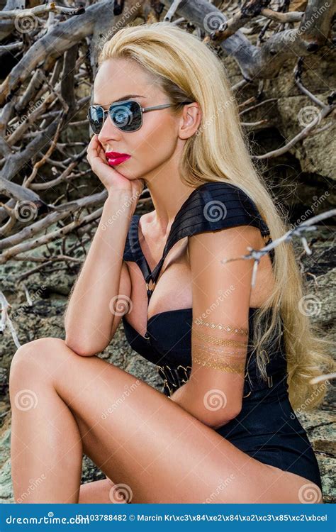 Blonde Female Model Sitting On Rocks Stock Photo Image Of Lingerie Landscape 103788482