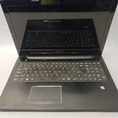 Unboxed Lenovo Ec Laptop Simon Charles Auctioneers