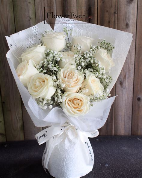 White Rose Bouquet in 2024 | White rose bouquet, White flower bouquet, Rose bouquet