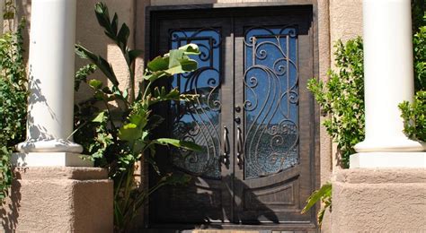 Creating A Custom Look With Metal & Glass Doors - Artistic Iron Works