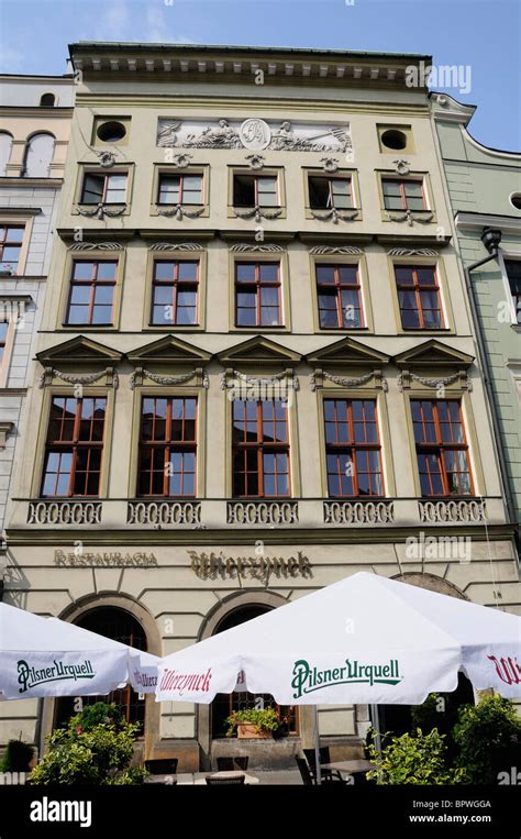 Wierzynek Restaurant Exterior With Umbrellas In Rynek Glowny Town