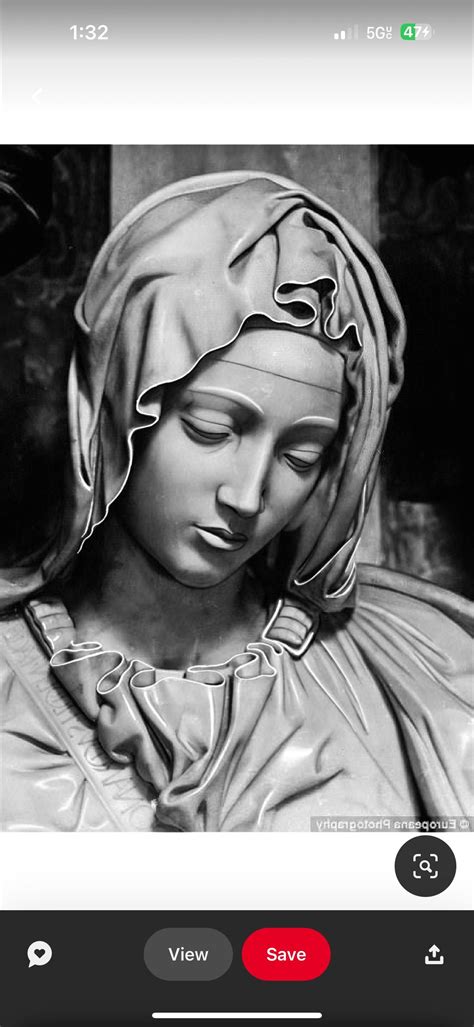 A Black And White Photo Of A Statue With A Veil On It S Head