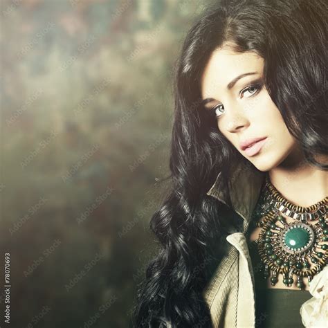 Fashion Model Brunette With Professional Makeup And Long Hair Stock Photo Adobe Stock