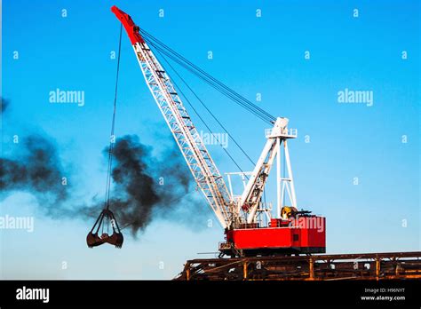 Crane in commercial dock Stock Photo - Alamy