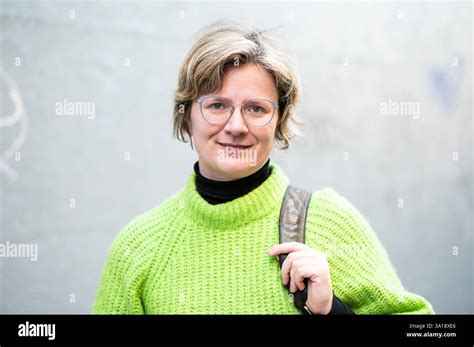 Portrait Of A 38 Yo White Woman With Blonde Hair And A Green Sweater Brussels Belgium Model