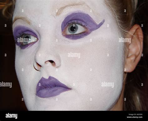 Girl with white face makeup Stock Photo - Alamy