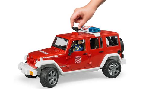 Игрушка Bruder внедорожник Jeep Wrangler с пожарником, мигалки (02528 ...