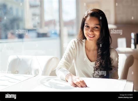 Portrait Of A Happy Beautiful Brunette Stock Photo Alamy