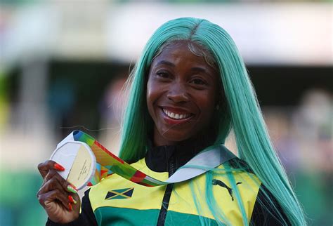 Jamaica's Fraser-Pryce cruises into 200m semis at World Championships