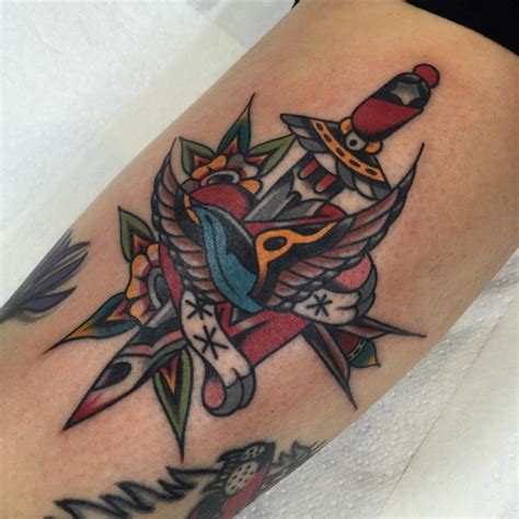 Traditional Dagger Heart Tattoo