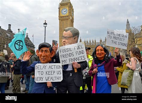 Masked Activists Opposite The Houses Of Parliament During An Extinction