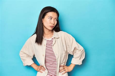 Premium Photo Asian Woman In Layered Shirt And Striped Tshirt