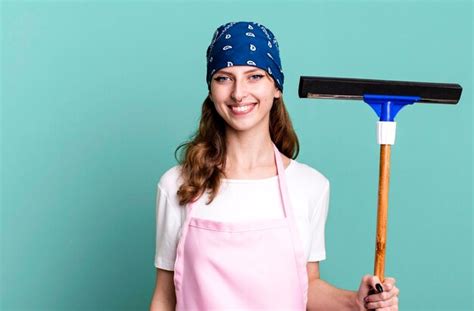 Premium Photo Caucasian Pretty Blonde Woman Housekeeper And Cleaning Windows Concept
