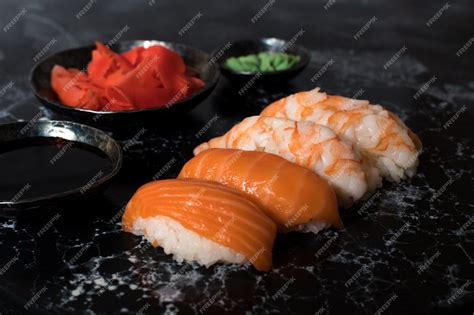 Premium Photo Close Up Of Sashimi Sushi Set On Black Table