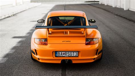 Download Wallpaper 2048x1152 Porsche 911 Gt3 Rs Porsche Car Orange Back View Ultrawide