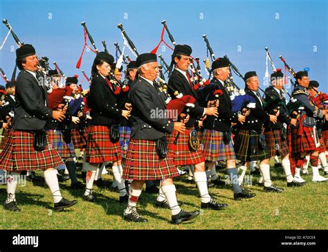 Scottish Pipers Blowing Bagpipes Scotland United Kingdom Great Britain