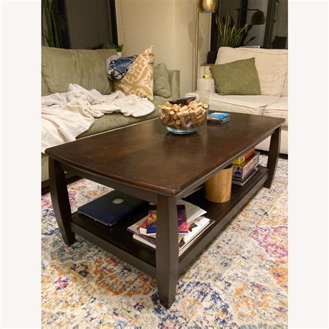 Dark Brown Coffee Table with Storage - AptDeco