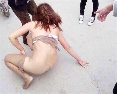 NSFW PICS Chinese Mistress Is Stripped Naked And Beaten Senseless In Backlash Against Booming