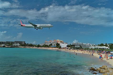 American Airlines landing at St. Maarten airport Photograph by David ...