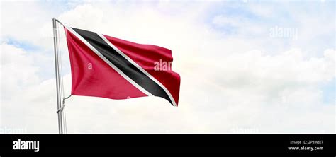 Trinidad And Tobago Flag Waving On Sky Background 3d Rendering Stock