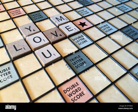 Spelling Out Words With Scrabble Tiles Hi Res Stock Photography And