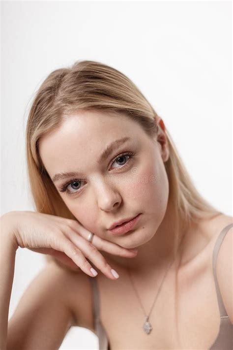 Pretty Caucasian Girl With Naked Shoulders Looking At Camera Portrait Close Up Stock Image