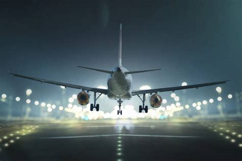 Airplane Landing Stock Photos, Pictures & Royalty-Free Images - iStock