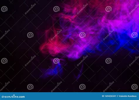 Colored Smoke On A Black Background Blurred Abstract Background