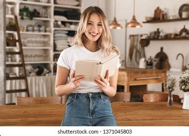 Sexy Blonde Bookworm Girl With Books And Guitar Background 2K Wallpaper