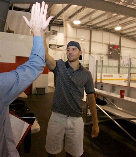 High Fiving Celebrities Chris Tanev Of The Vancouver Canucks