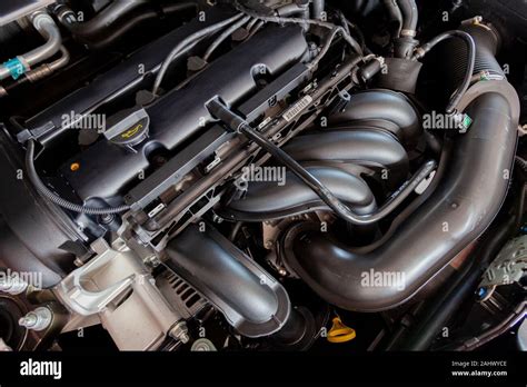 New car engine. Car hood open. Automotive industry Stock Photo - Alamy