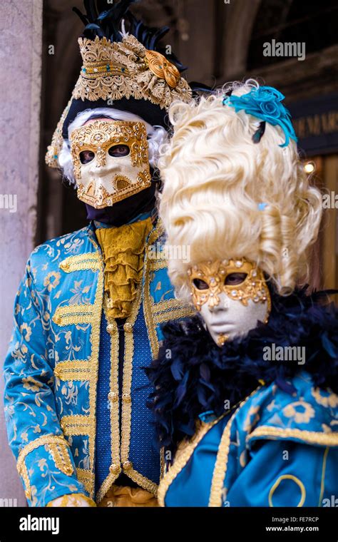 Two Venetian carnival costumes, Italy Stock Photo - Alamy