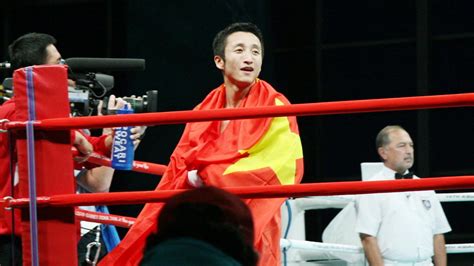 China's Olympic champion Zou wins professional debut - Boxing ...