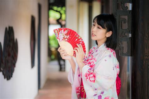 Images Brunette Girl Bokeh Hand Fan Kimono Female Asian Hands