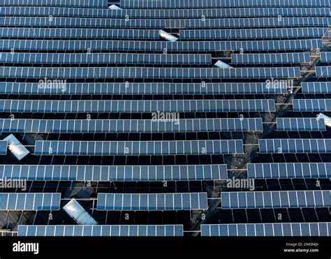 Large Solar Panel Array Stacked Farm On A Distribution Warehouse